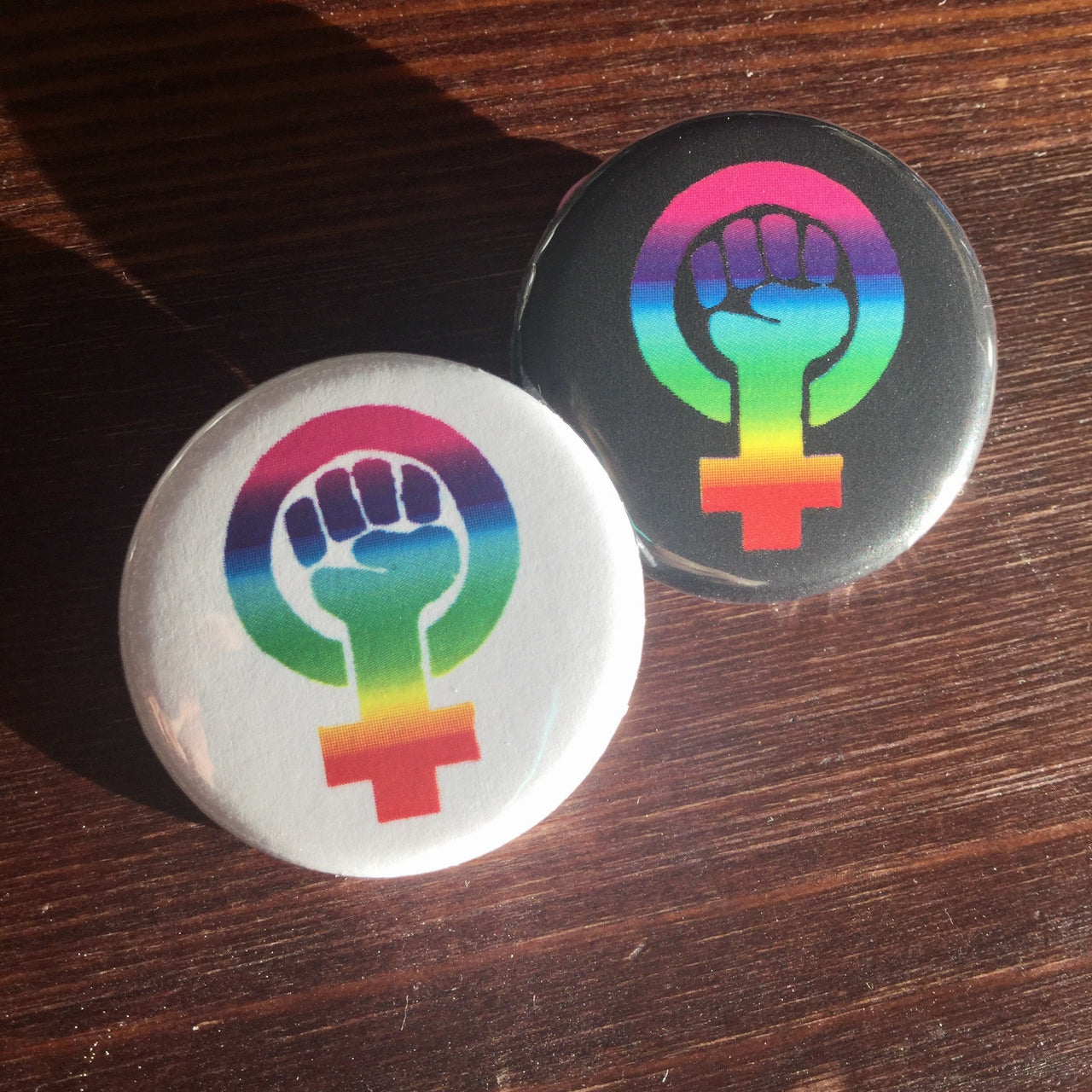 Rainbow black feminism symbol - Radical Buttons