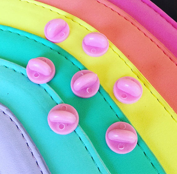 Pink rubber clutches - Radical Buttons