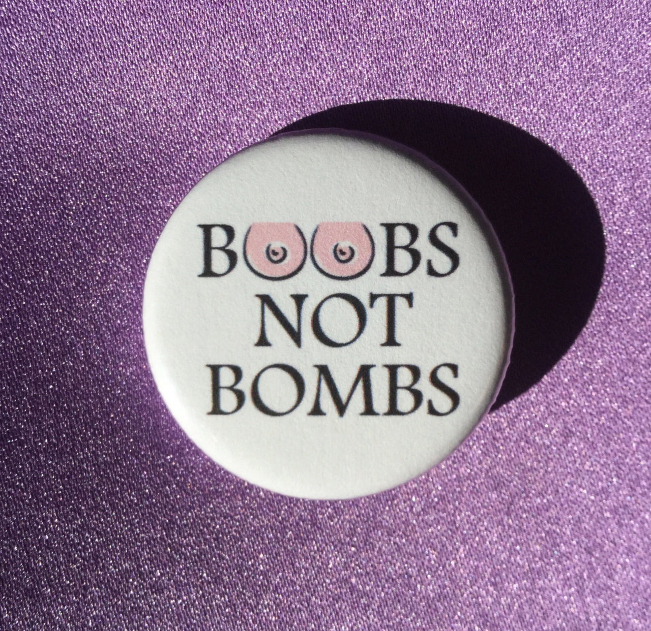 Boobs not bombs button / Anti-war button - Radical Buttons