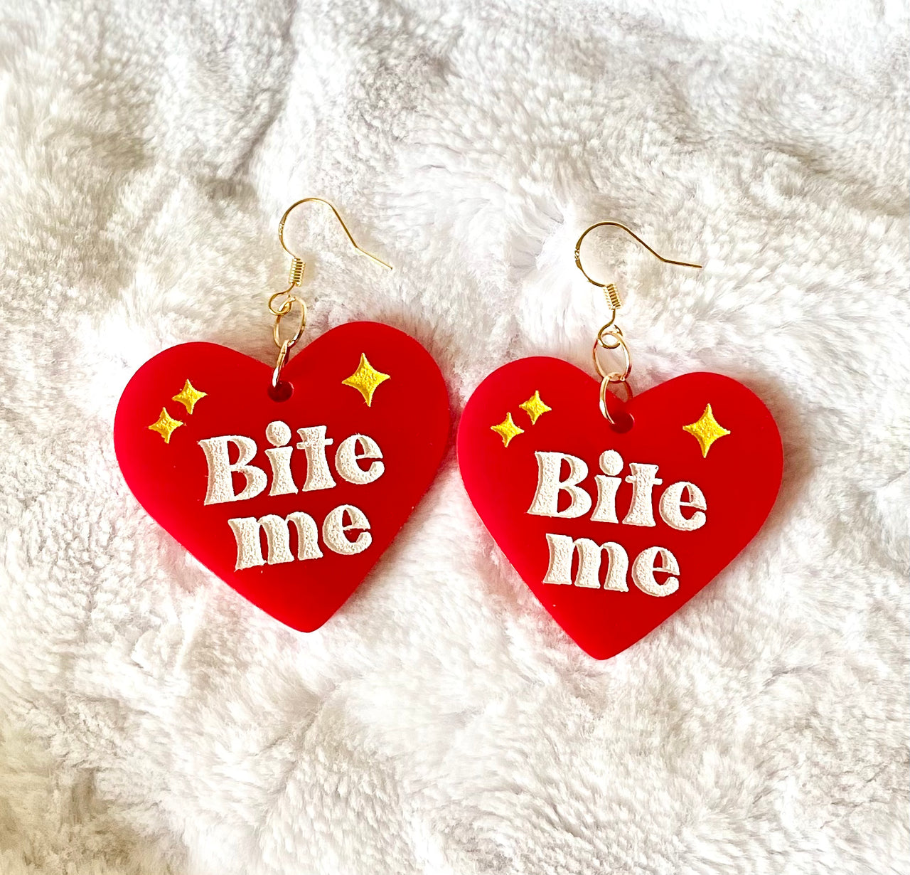 Bite me heart earrings