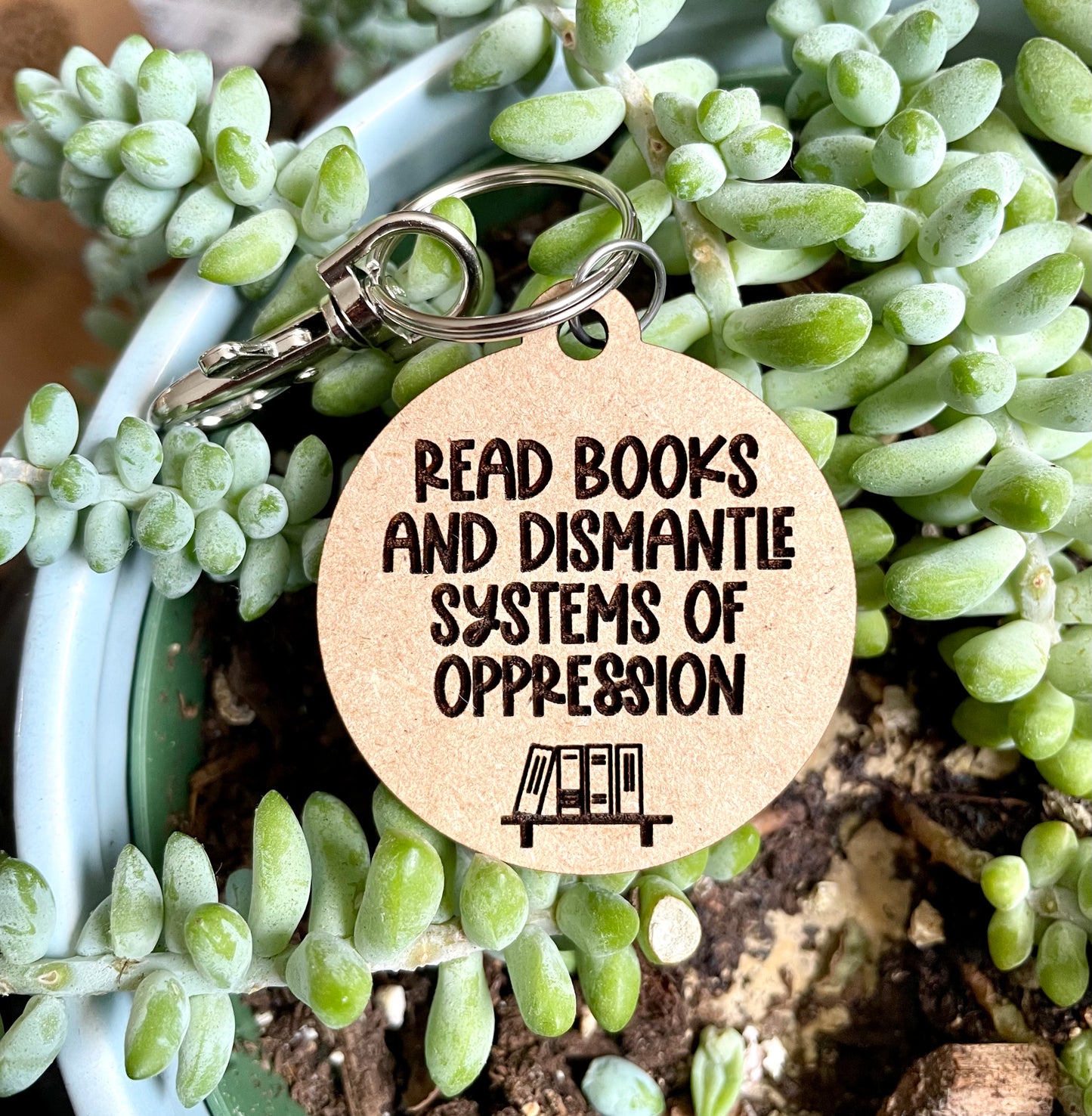 Read books and dismantle systems of oppression keychain