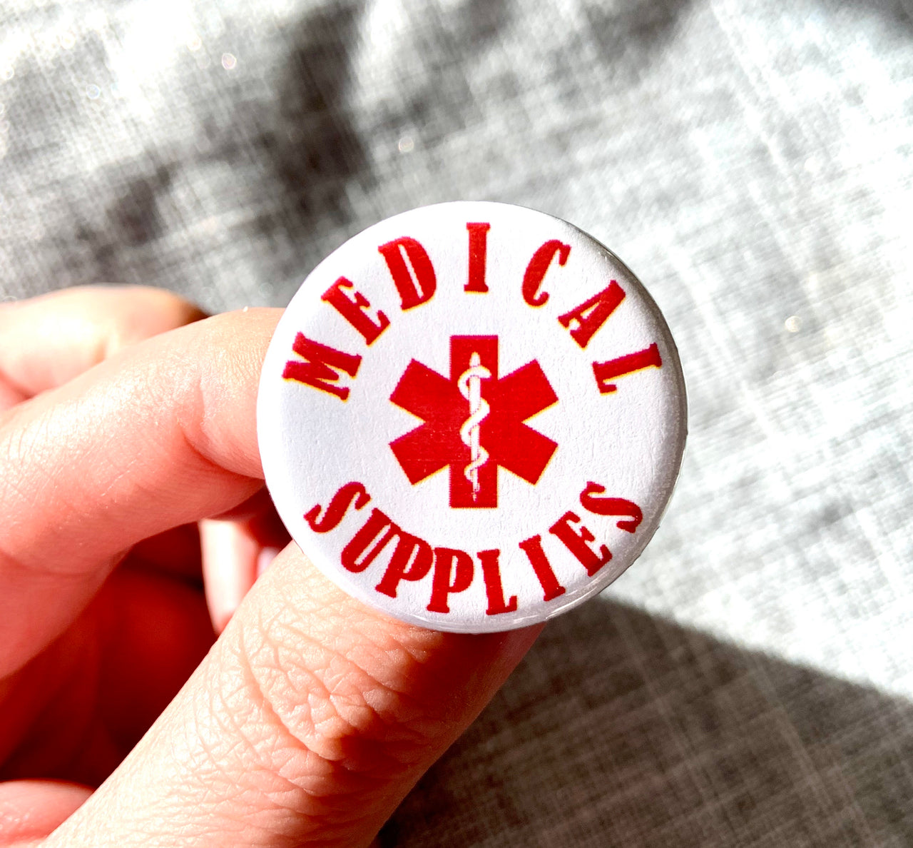 Medical supplies button - Radical Buttons